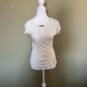 Off white comfortable and lightweight blouse. Wear it alone or under a b…